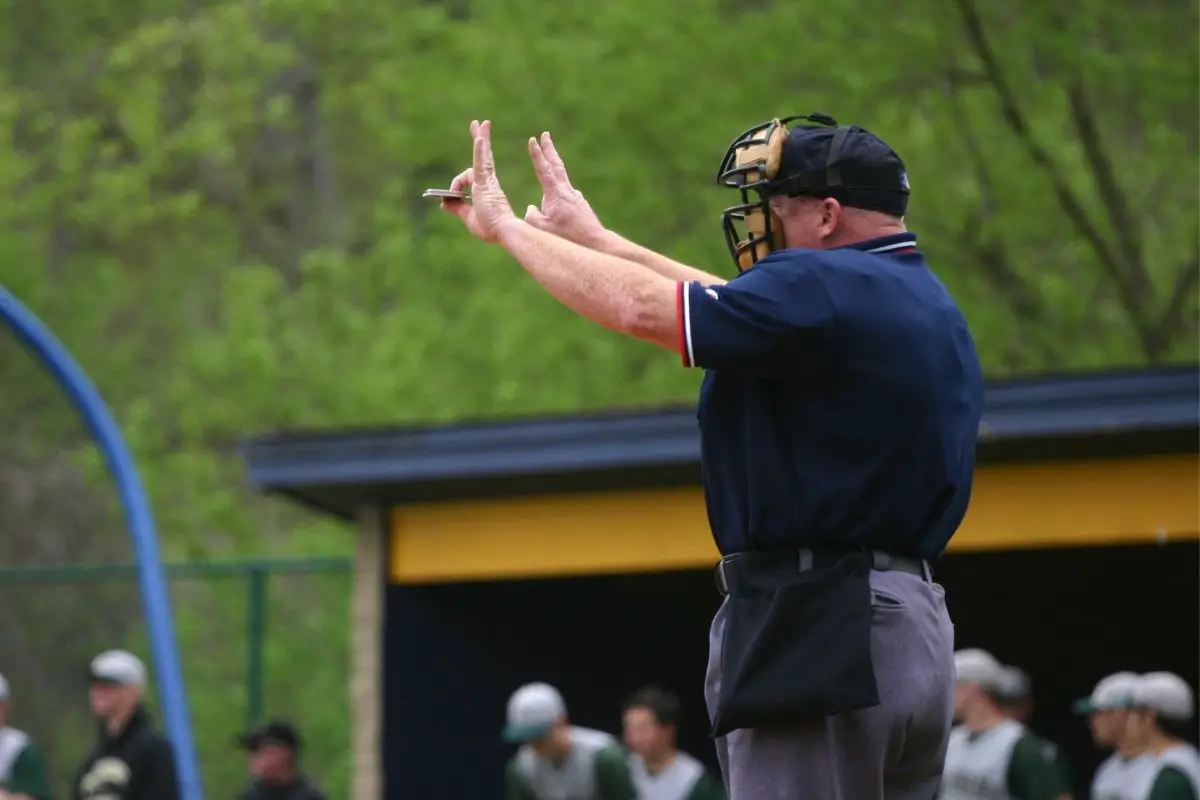 What Happens If A Player Makes Contact With An Umpire In Softball?